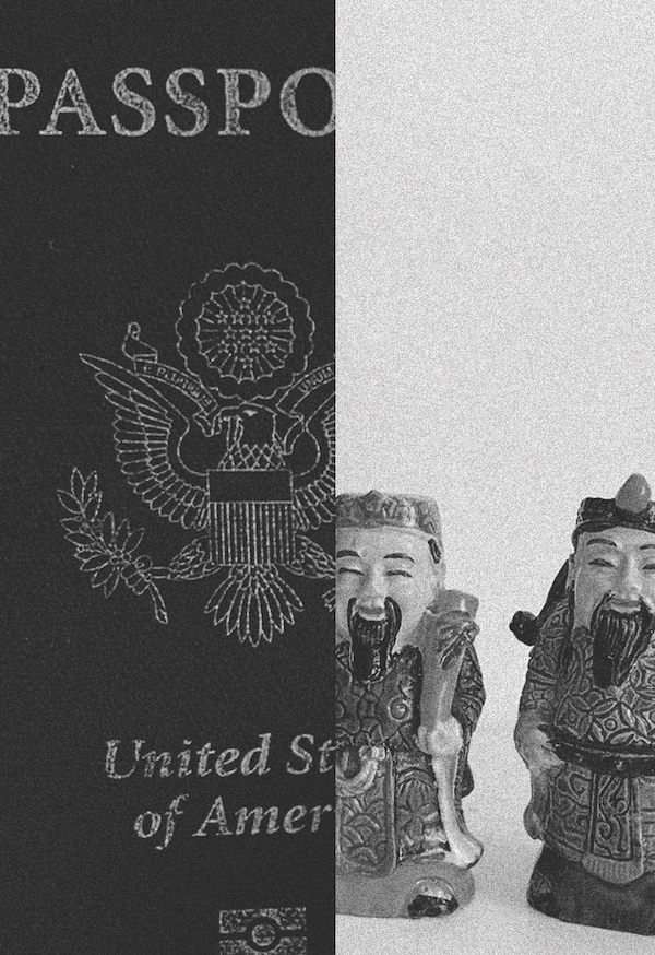 a US passport lies beside two small figures